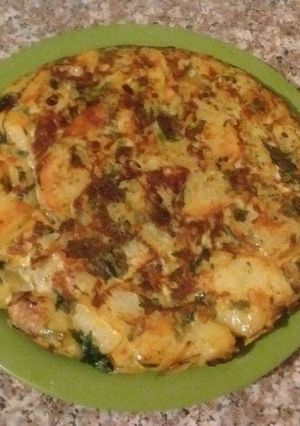 Una foto de Tortilla de papas y acelga