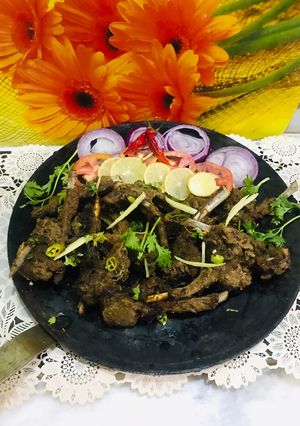 A picture of Tawa Motton chanp with zeera rice.
