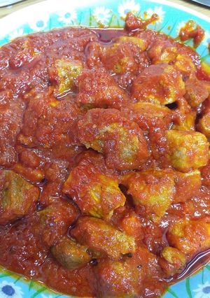 Una foto de Magra con tomate
