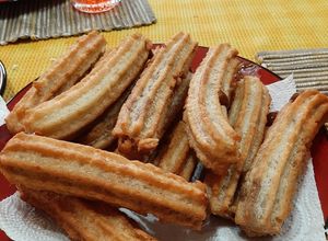 Una foto de Churros con manjar