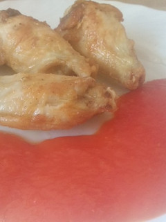 Una foto de Alitas de pollo al ajillo