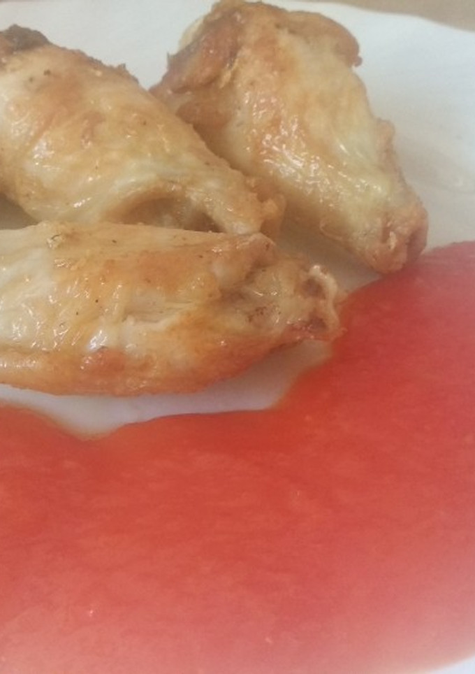 Una foto de Alitas de pollo al ajillo