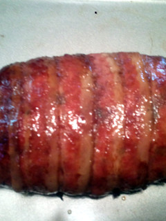 A picture of Grilled bacon wrapped meatloaf.