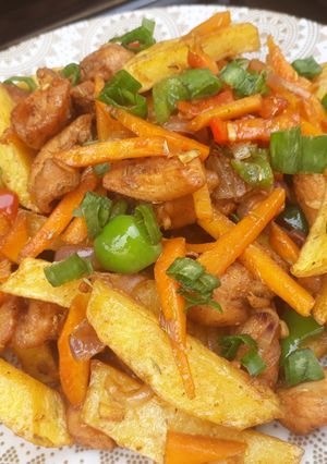A picture of Potato and chicken stir fry.