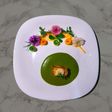 Mole verde de puerco y mousse de frijol blanco
