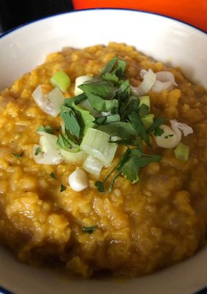 A picture of Red lentil dal (vegan if you sub the ghee 😁).