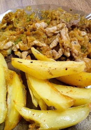 Una foto de Trocitos de cerdo dulce, ahumado con papas asadas