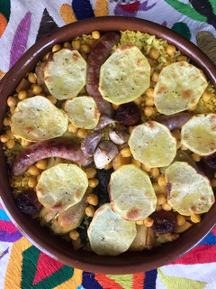Una foto de Cazuelita de arroz al horno con restos del cocido