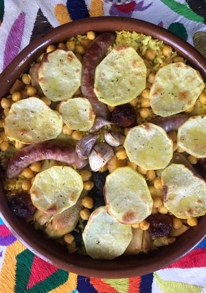 Una foto de Cazuelita de arroz al horno con restos del cocido