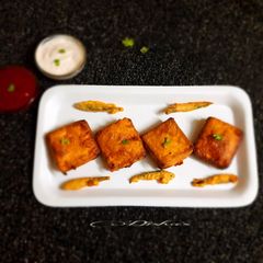 A picture of Stuffed Cream Crackers Fritters.