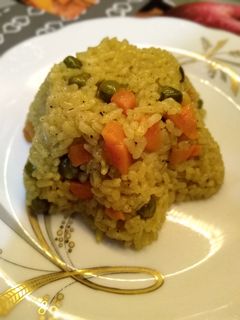 صورة لوصفة رز بالبسلة والجزر 😋💓