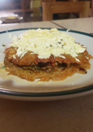 Una foto de Sándwich de papa mechada