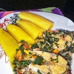 A picture of Boiled plantain and vegetable sauce.