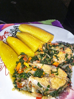 A picture of Boiled plantain and vegetable sauce.