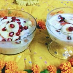 A picture of Sweet Curd with Fruits.