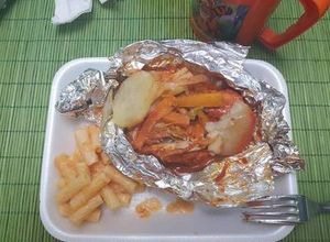 Una foto de Pollo en achiote al vapor