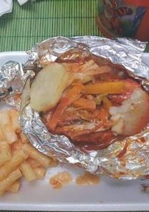 Una foto de Pollo en achiote al vapor