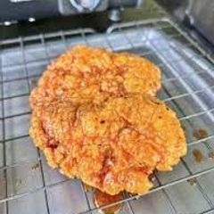 A picture of Grill Nation's Hot Honey Fried Chicken Sandwich.