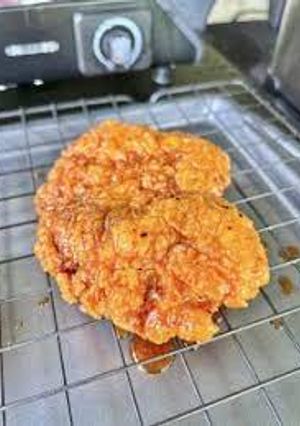 A picture of Grill Nation's Hot Honey Fried Chicken Sandwich.