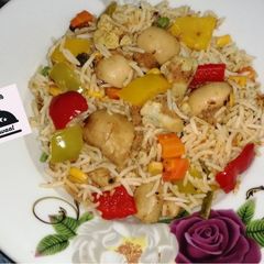 A picture of Stir fry vegetables and tuna rice.