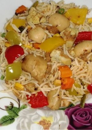 A picture of Stir fry vegetables and tuna rice.