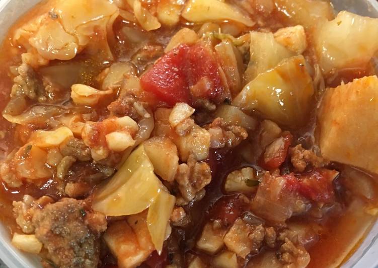 Step-by-Step Guide to Make Delicious NSNG crockpot unstuffed cabbage rolls (pigs in the blanket)