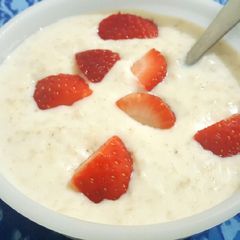 A picture of Strawberry Oats with milk and coconut 😍.