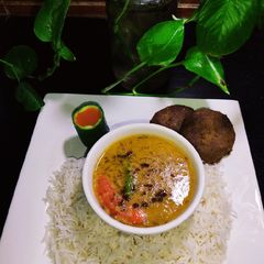 A picture of Dhabba Style Moong Masoor Tarka Daal With White Rice 🍚😋.