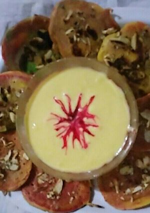 A picture of Sweet dryfruits mini besan uttapa colourful.