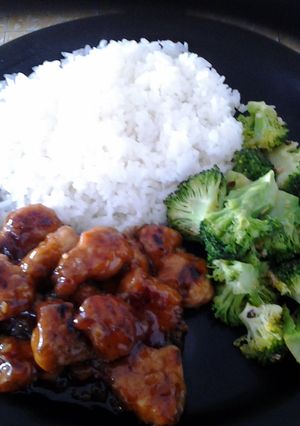 A picture of Asian Style Orange Chicken with Spicy Sauteed Brocoli.