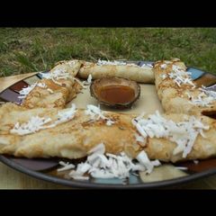 A picture of Pancake with grated coconut.
