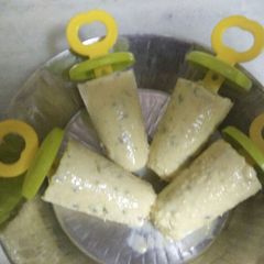 A picture of Malai Kesar Pista kulfi.