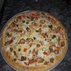 A picture of Freshly baked Pizza #CookpadApp #RamzankiTayari.