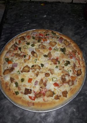 A picture of Freshly baked Pizza #CookpadApp #RamzankiTayari.