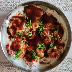 A picture of Methi spinach dahi vada.