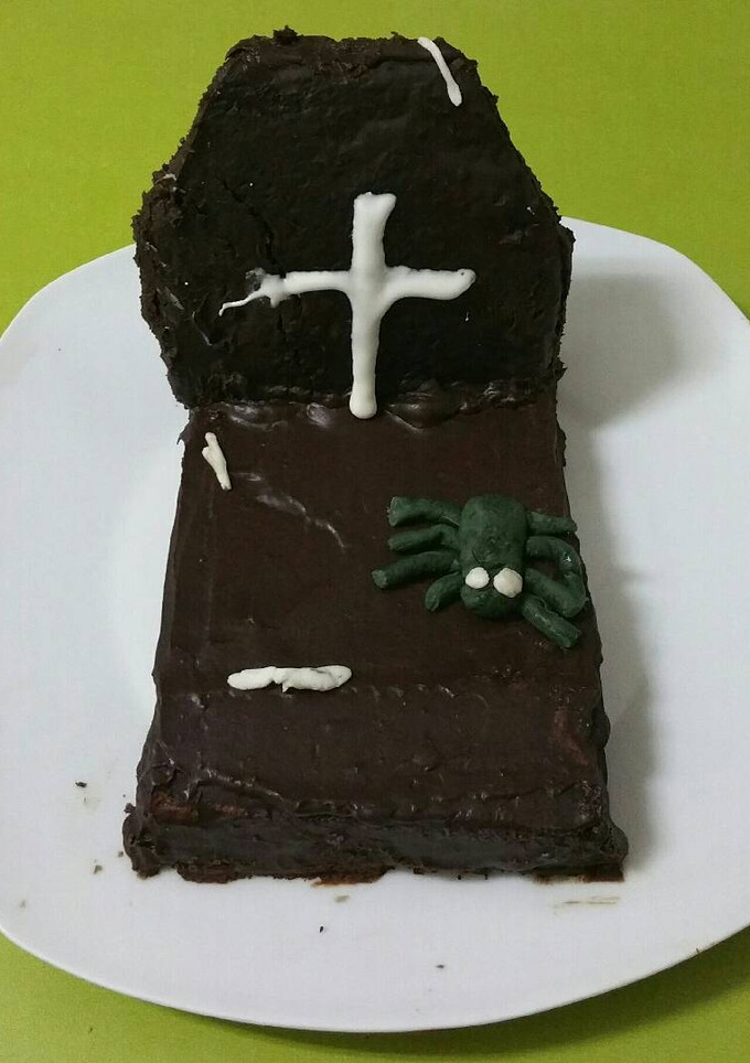 Una foto de Tumba de bizcocho de calabaza bañada en chocolate