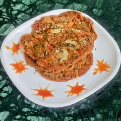 A picture of Til Veggies Masala Pancakes.