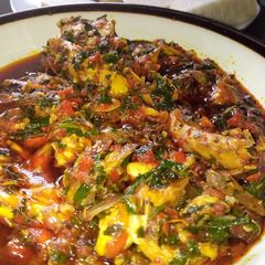A picture of Local nchianwu sauce with boiled yams.