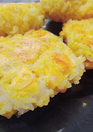 Una foto de 🌽 Torrejas de arroz y choclo 🌽