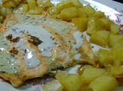 Una foto de pescado al roquefort