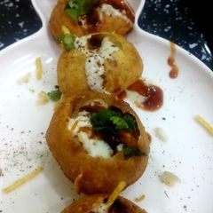 A picture of Stuffed ChurMur Dahi golgappa.