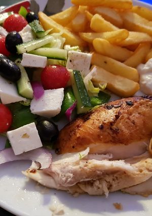 A picture of My Salt & Pepper fresh Chicken, Salad and homemade chips.