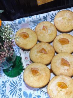 Una foto de Magdalenas de naranja y crema de leche