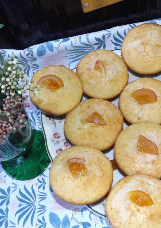 Una foto de Magdalenas de naranja y crema de leche