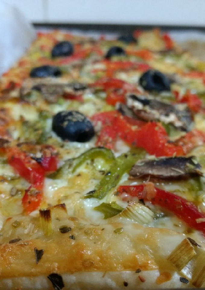 Una foto de Pizza vegetariana