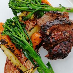 A picture of Venison in dark chocolate and raspberry Bbq sauce.