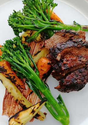 A picture of Venison in dark chocolate and raspberry Bbq sauce.