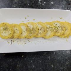 A picture of Mango kulfa pin wheels.
