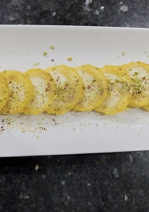 A picture of Mango kulfa pin wheels.
