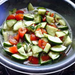 A picture of Cucumber and Tomato Salad.